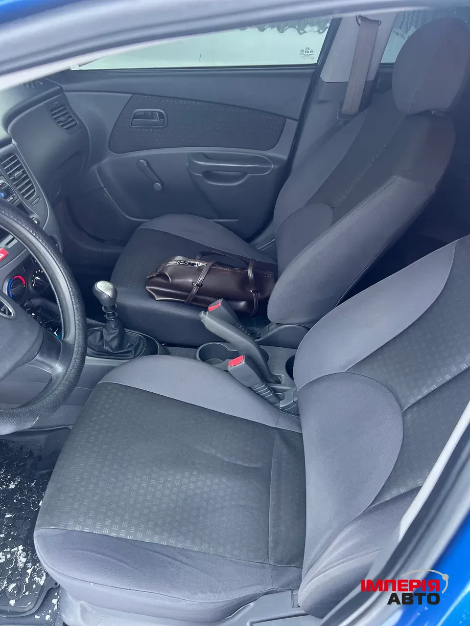 Kia Rio - фото 4