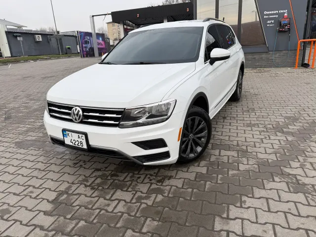Volkswagen Tiguan - фото 1