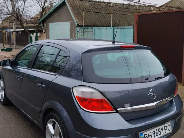 Opel Astra - фото 1