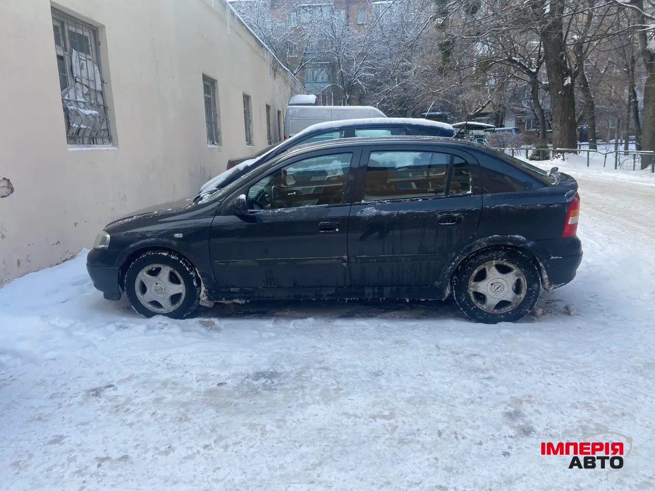 Opel Astra - фото 10