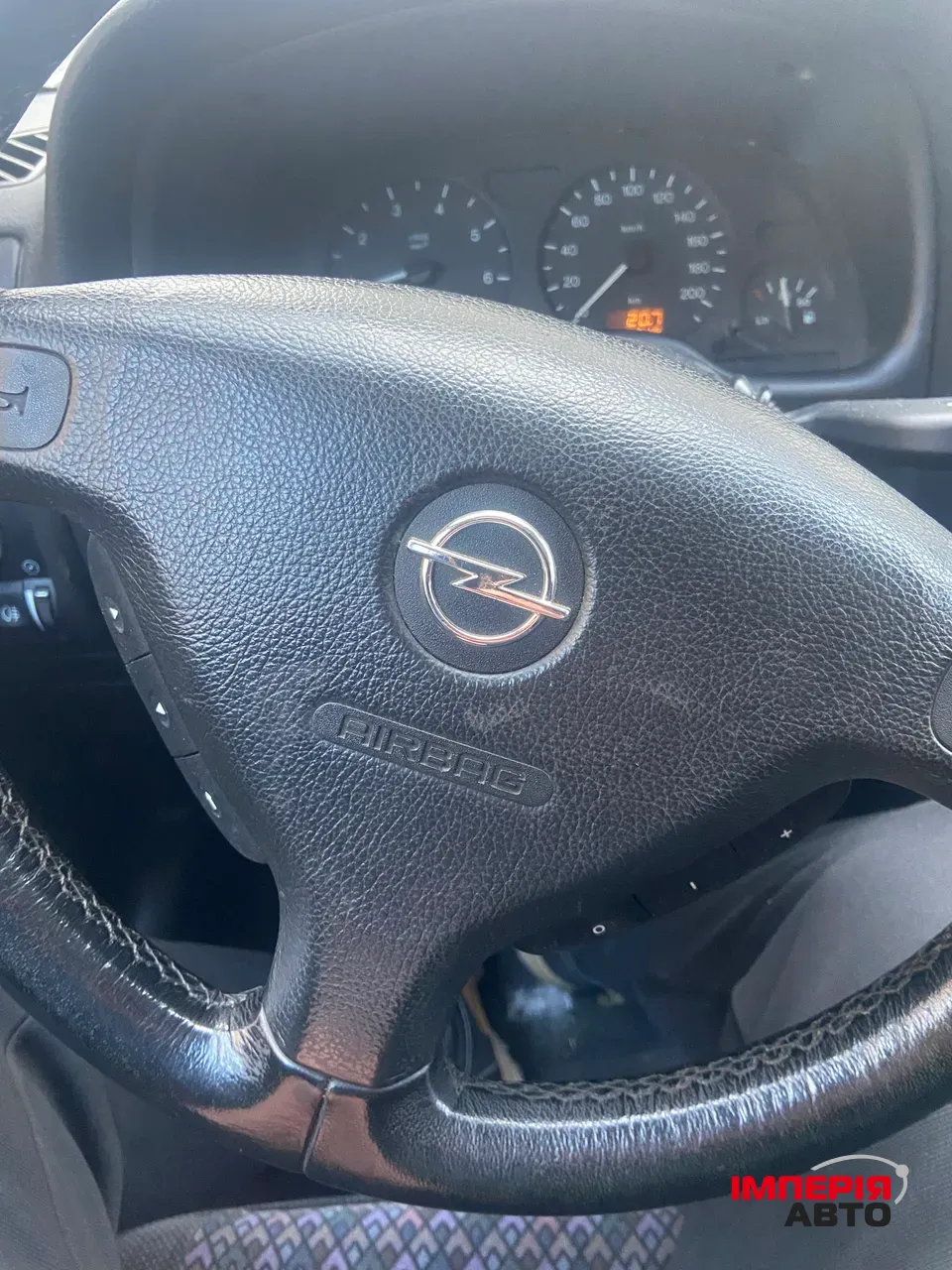 Opel Astra - фото 8