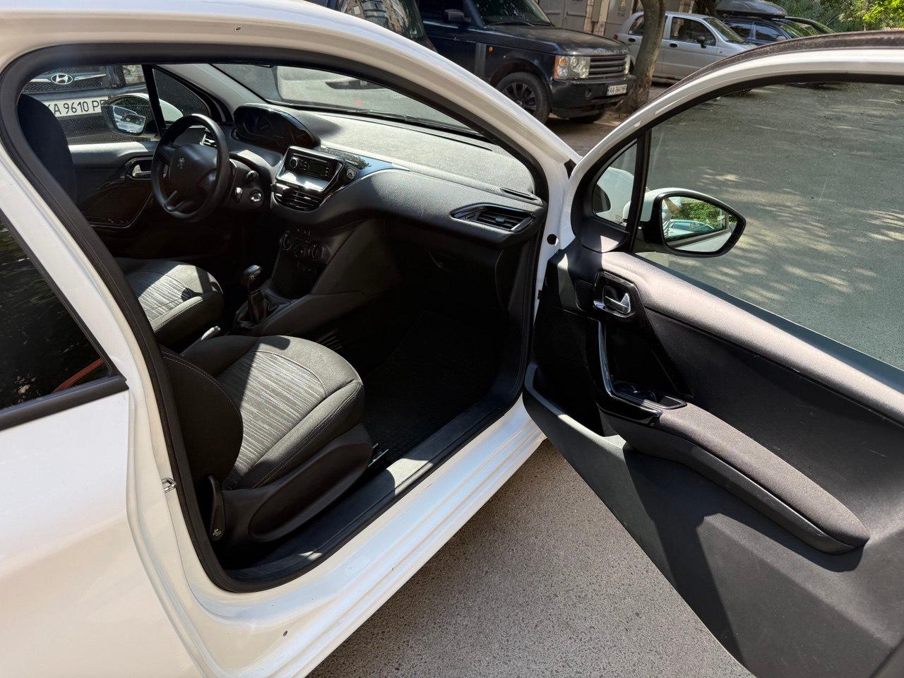 Peugeot 208 - фото 8