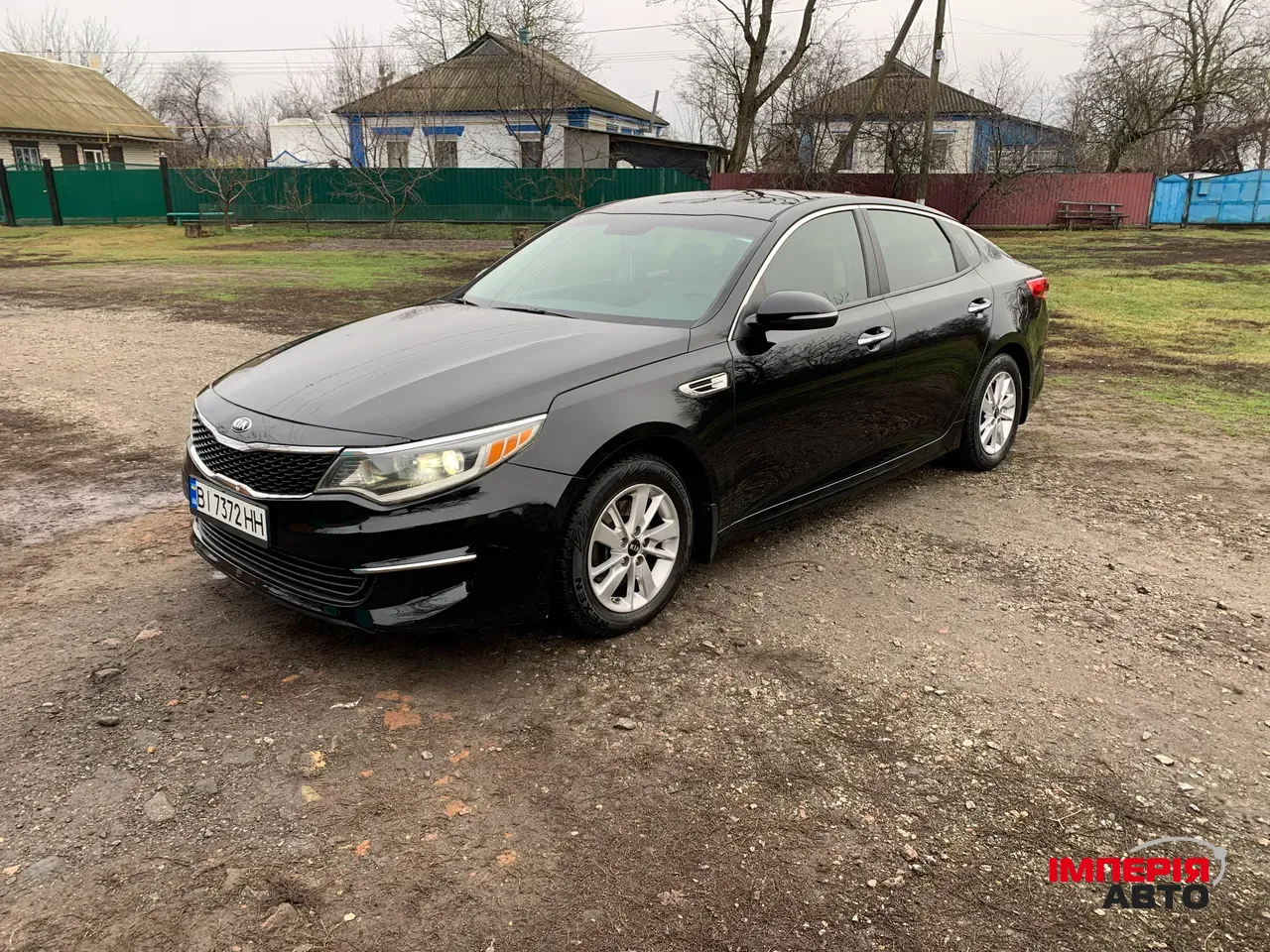 Kia Optima - фото 1
