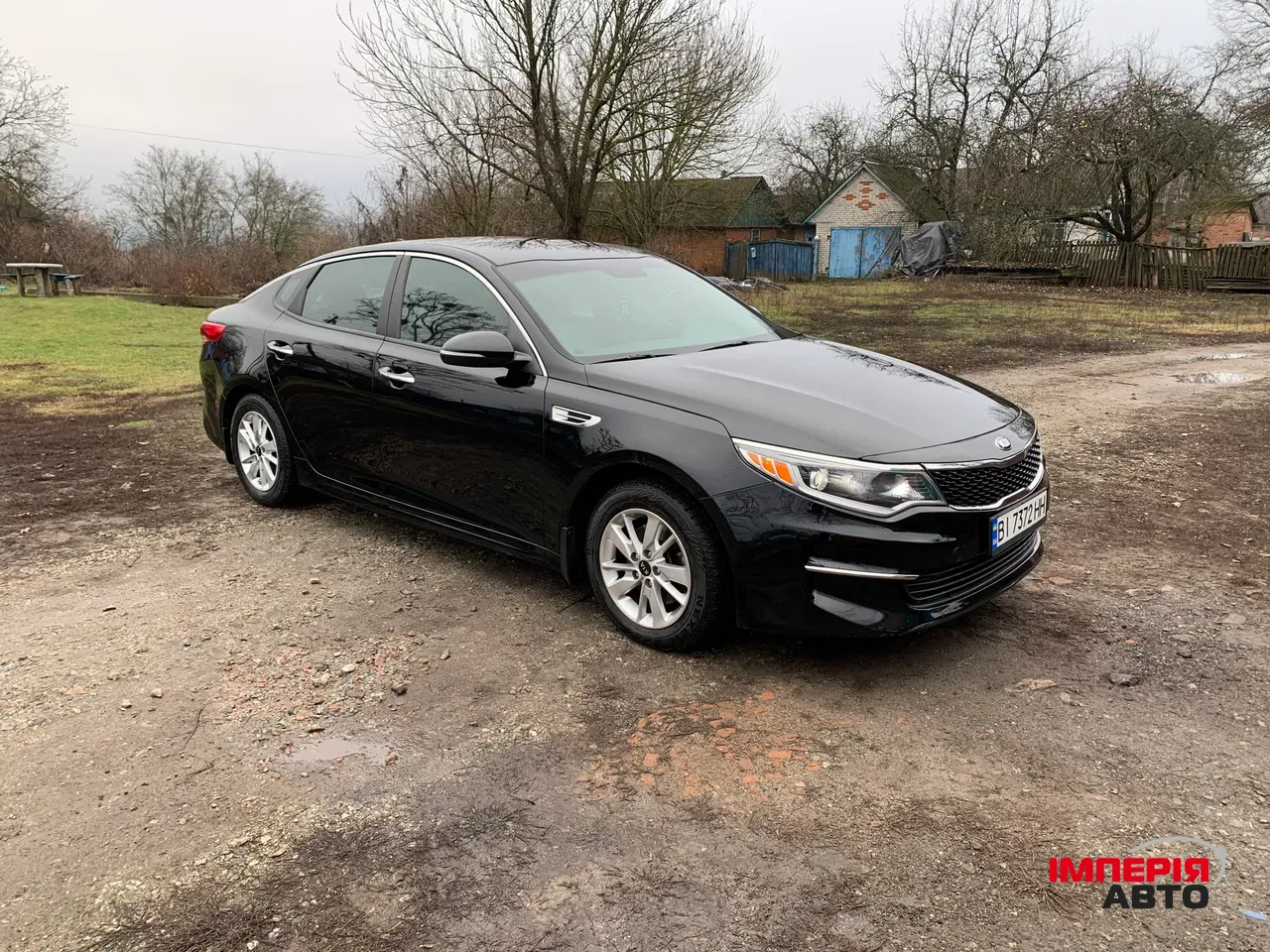 Kia Optima - фото 7