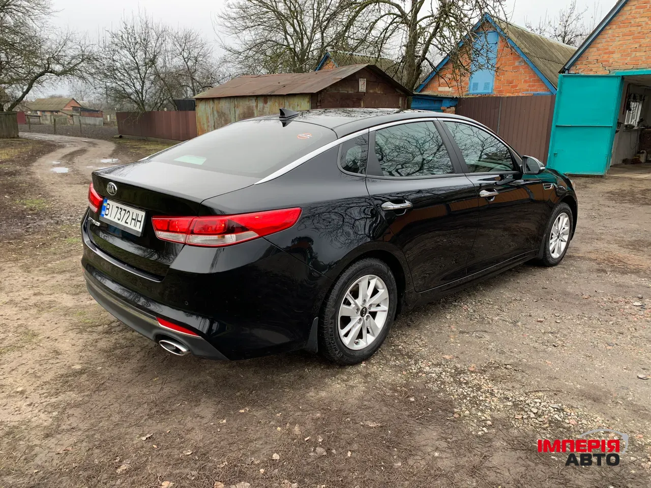 Kia Optima - фото 5