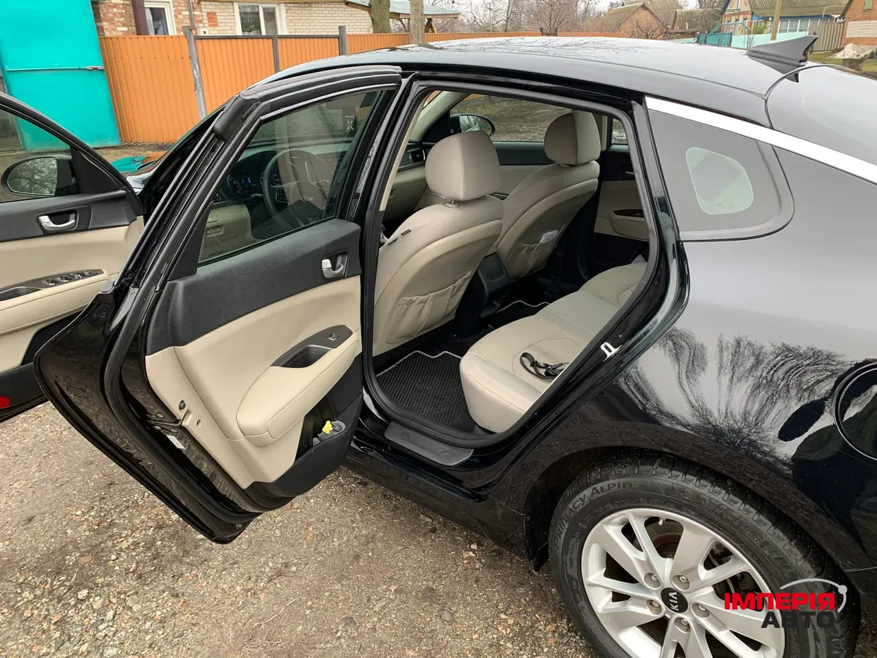 Kia Optima - фото 12