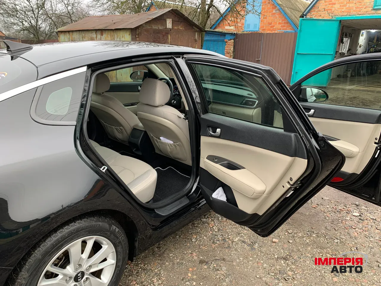 Kia Optima - фото 16