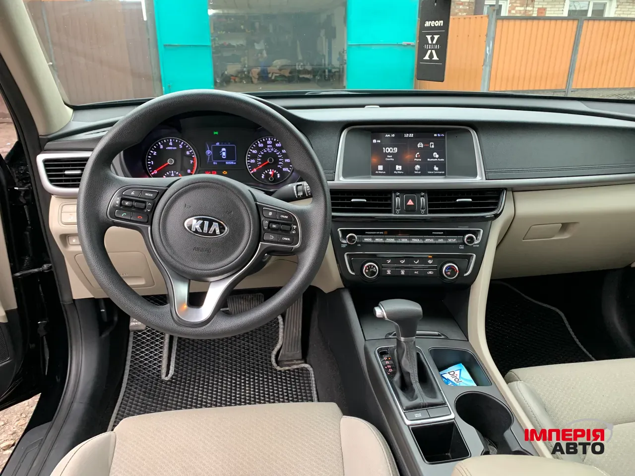 Kia Optima - фото 17