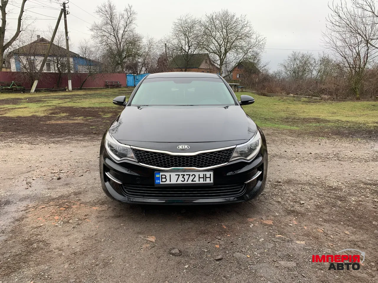 Kia Optima - фото 8