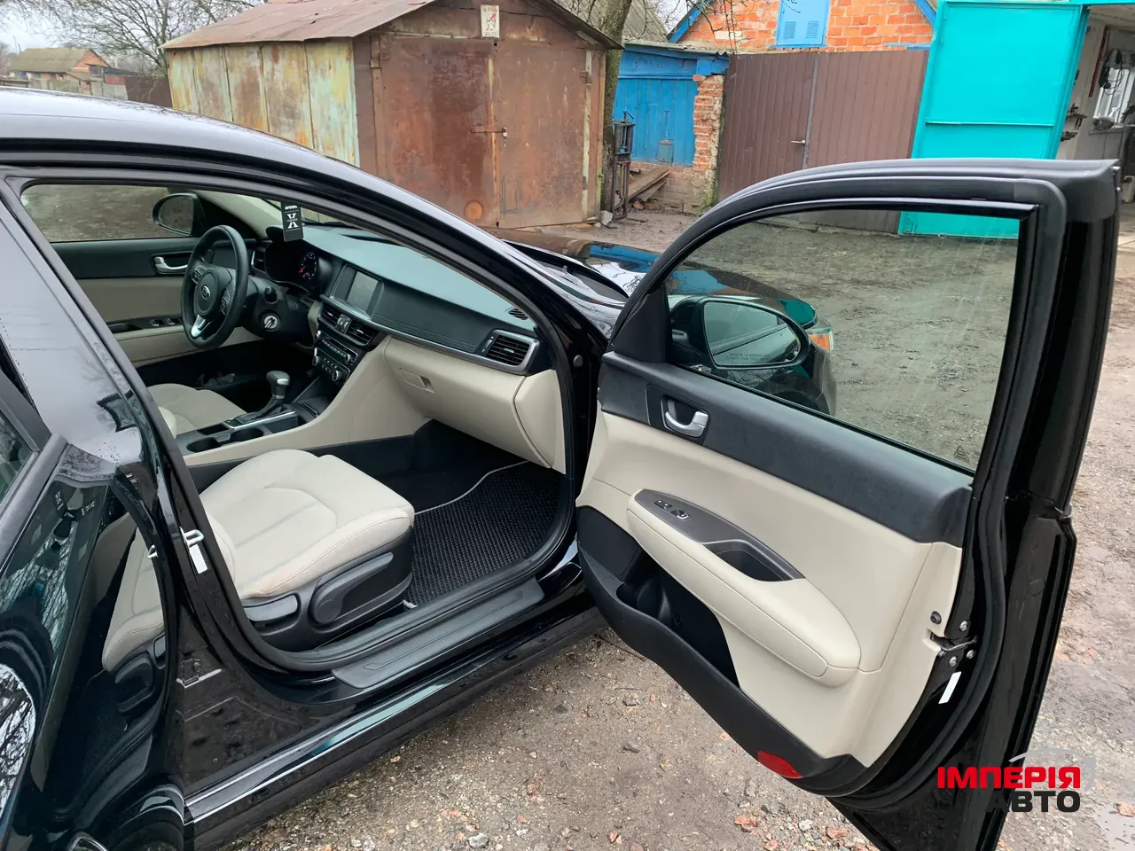 Kia Optima - фото 14