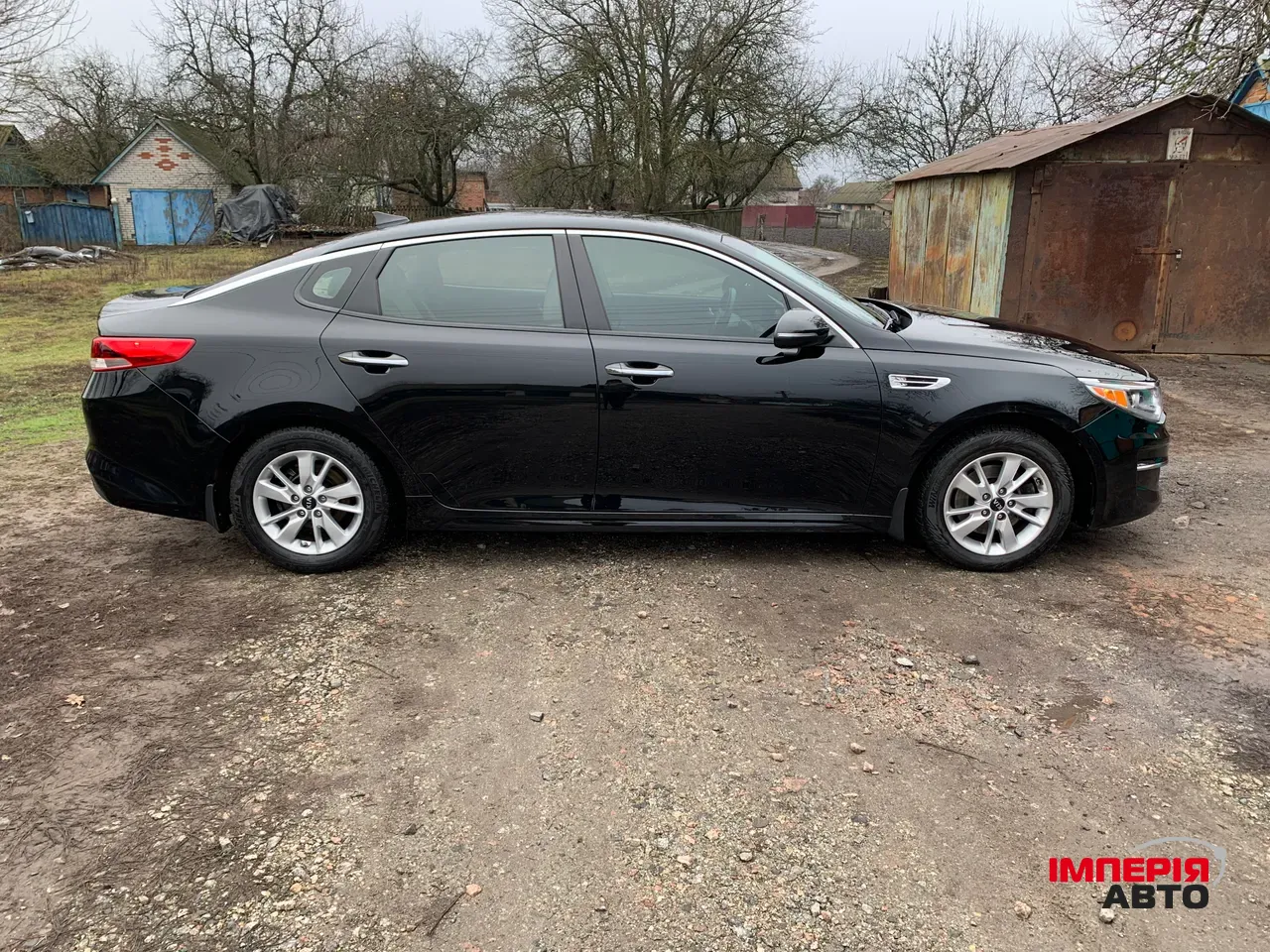 Kia Optima - фото 6
