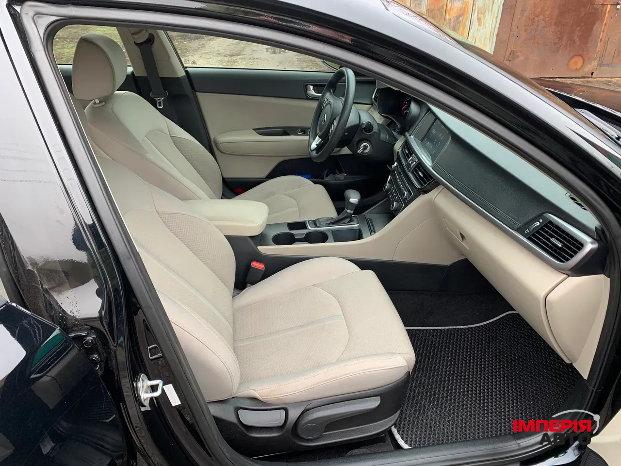 Kia Optima - фото 13