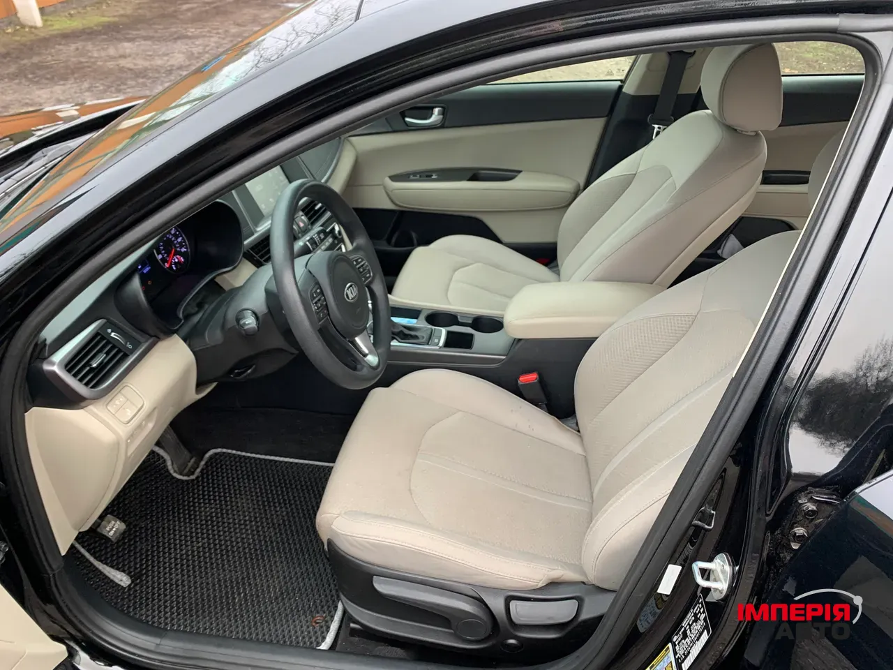 Kia Optima - фото 9