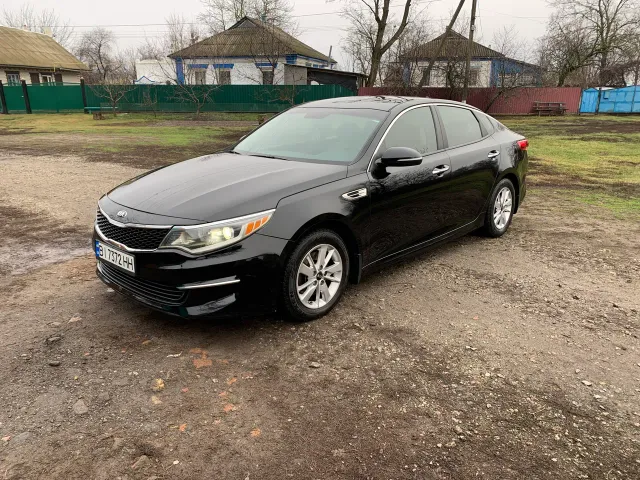 Kia Optima - фото 1