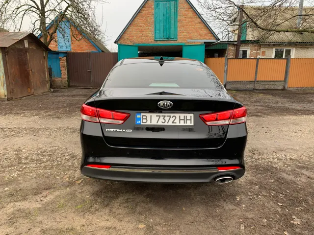 Kia Optima - фото 4