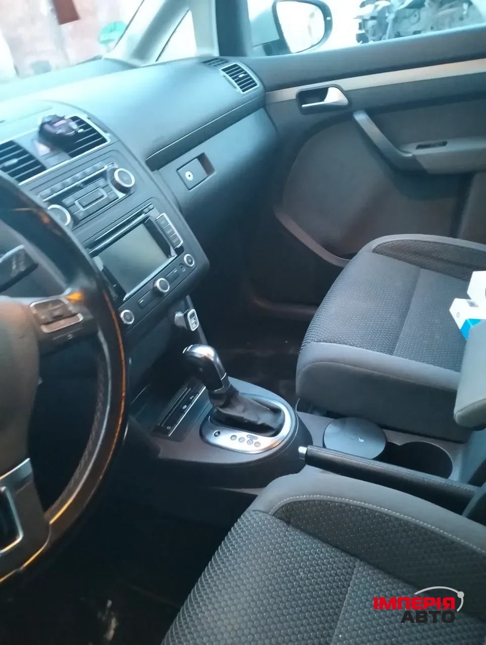 Volkswagen Touran - фото 11