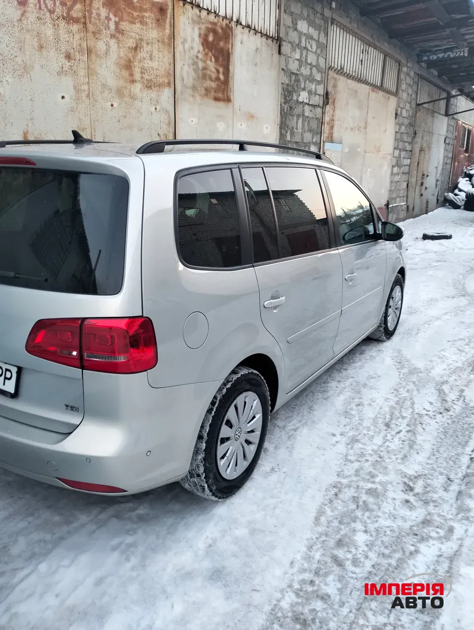 Volkswagen Touran - фото 5