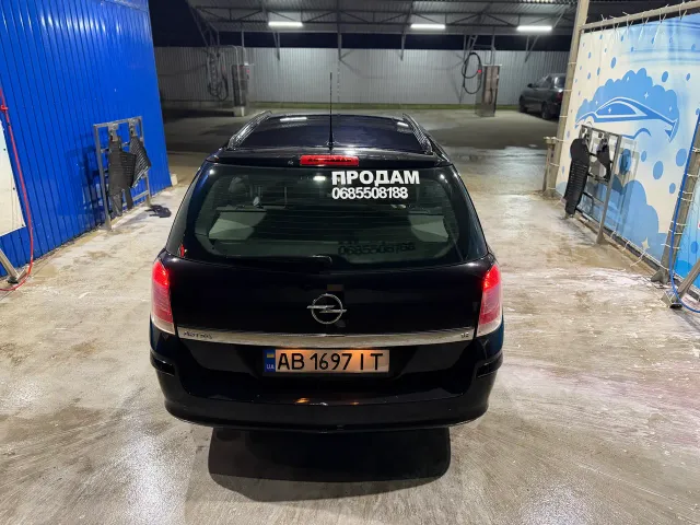 Opel Astra - фото 5