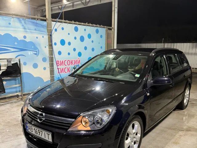 Opel Astra - фото 1