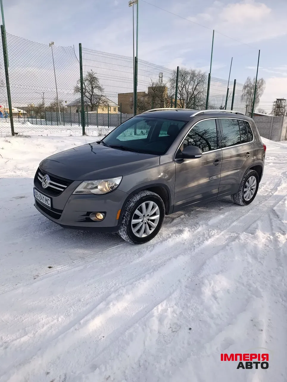 Volkswagen Tiguan - фото 1