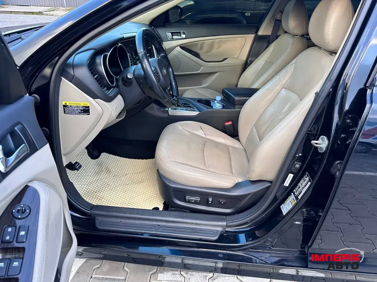 Kia Optima - фото 10