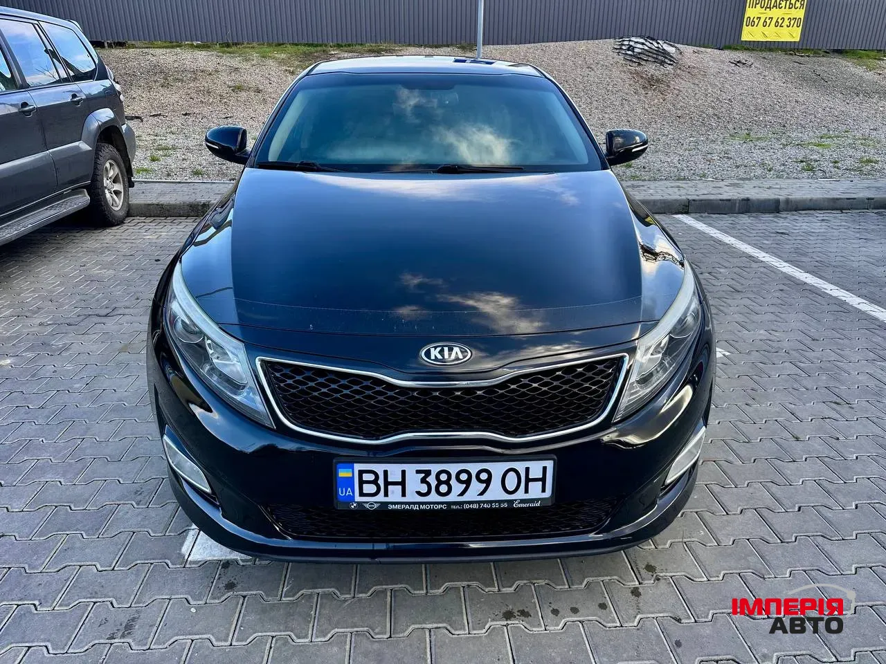 Kia Optima - фото 4