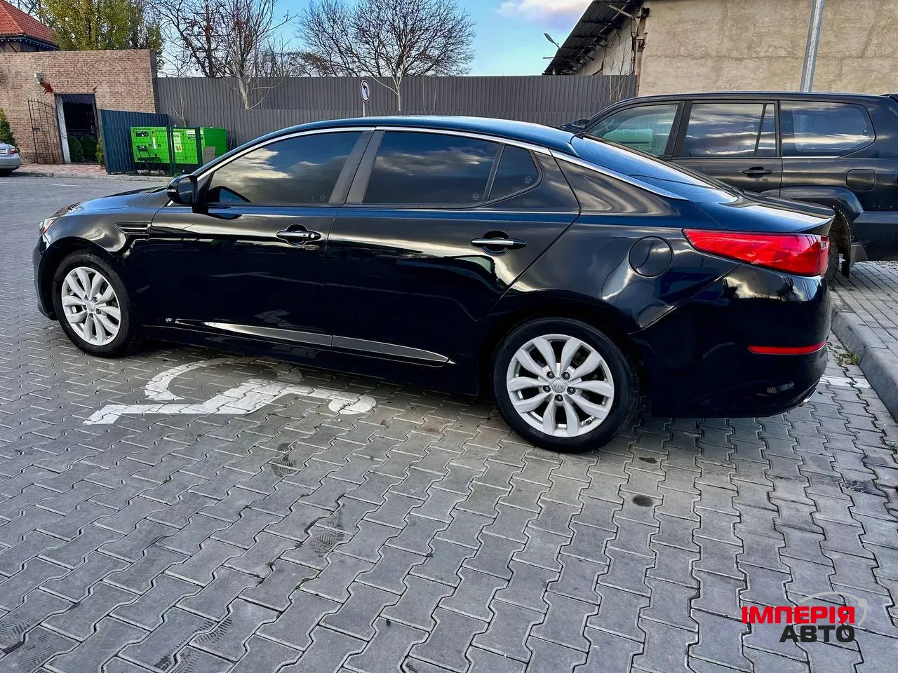 Kia Optima - фото 7