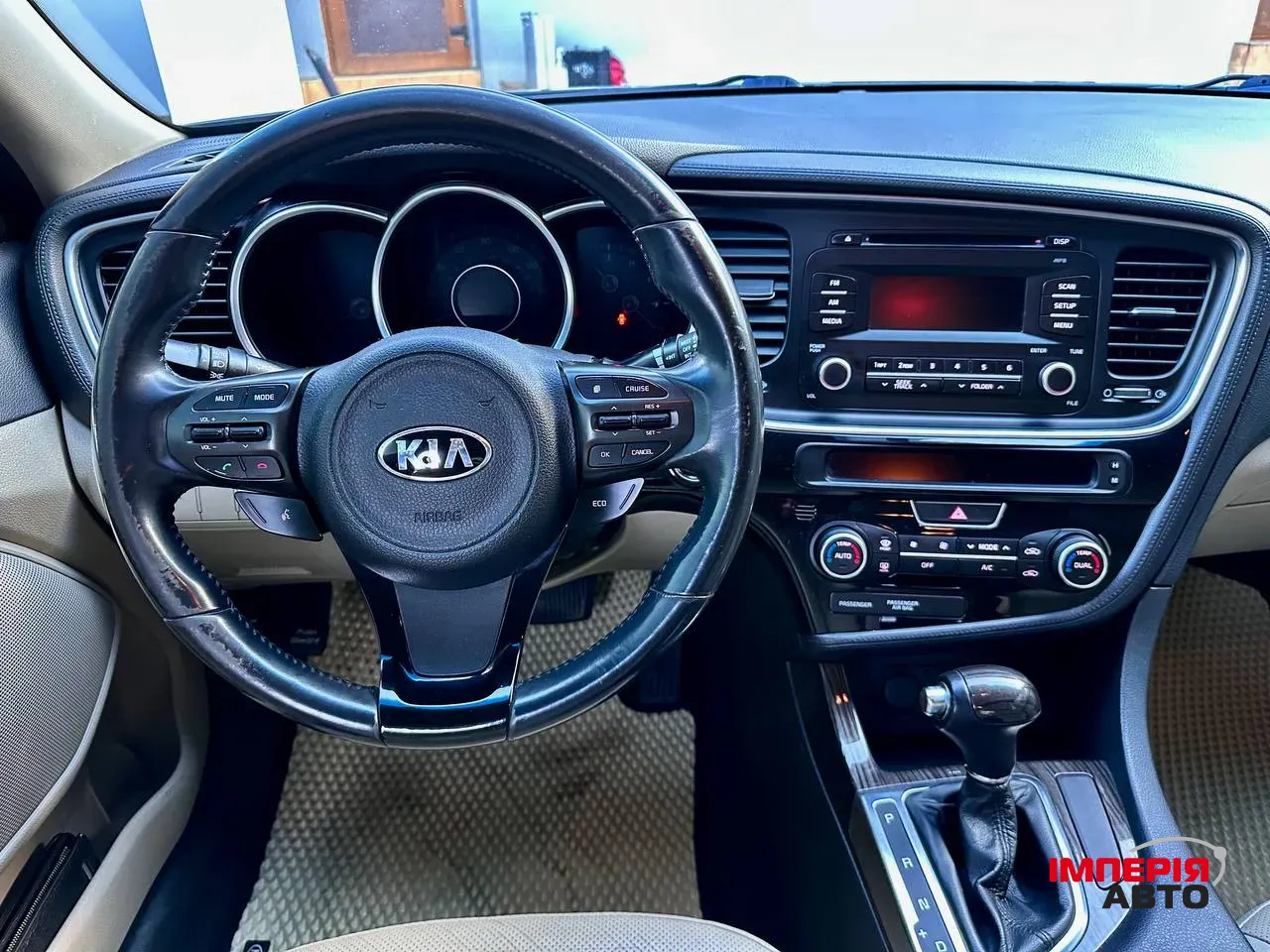 Kia Optima - фото 6