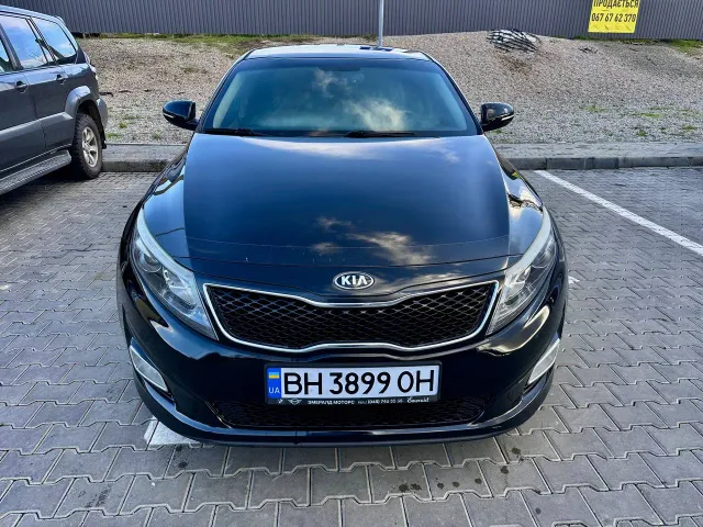 Kia Optima - фото 4