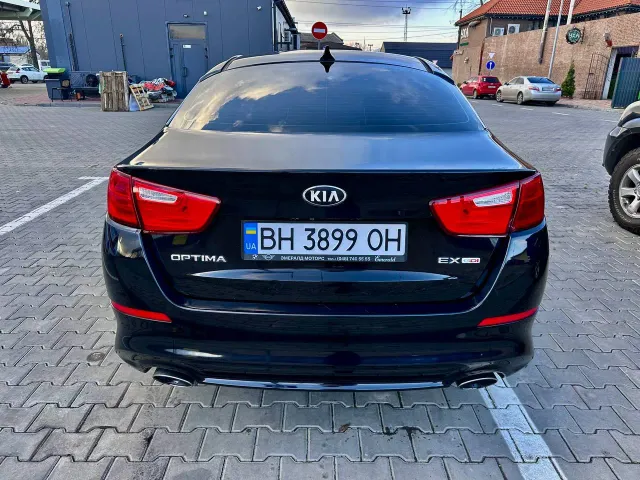 Kia Optima - фото 5