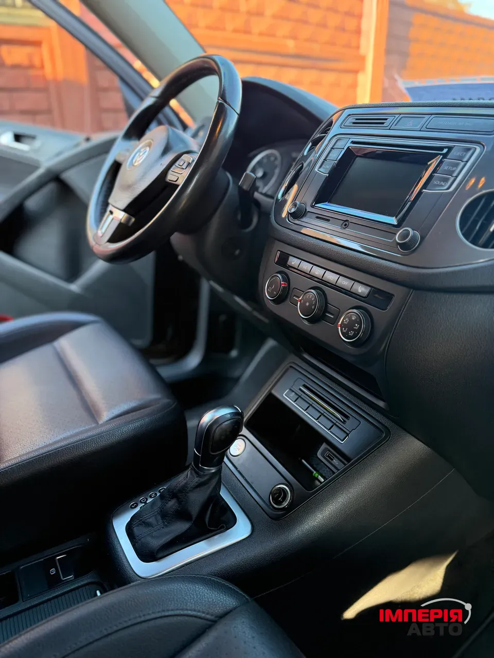 Volkswagen Tiguan - фото 11