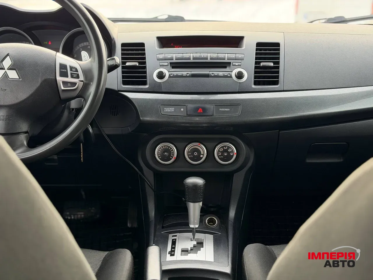 Mitsubishi Lancer - фото 41