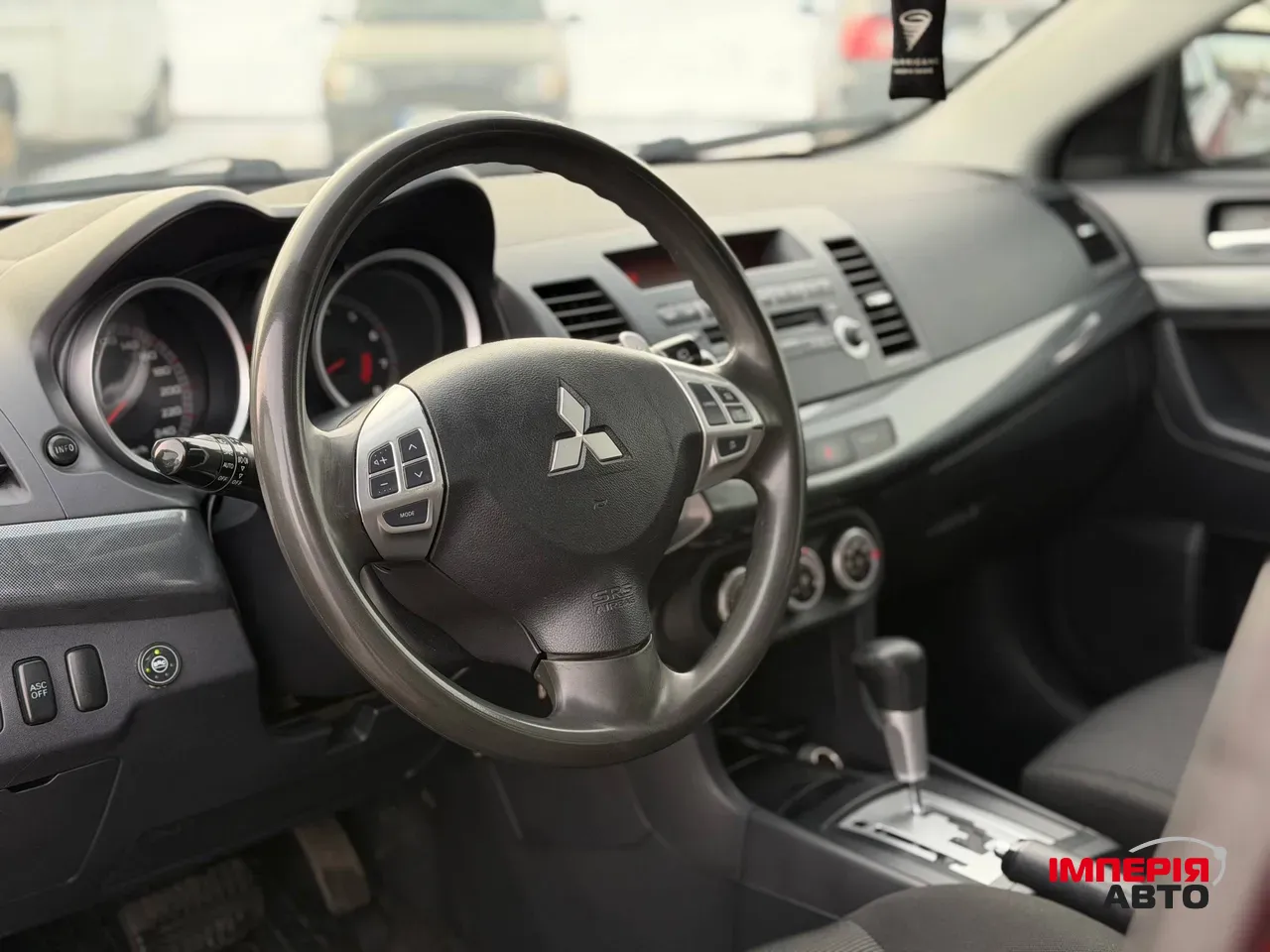 Mitsubishi Lancer - фото 34