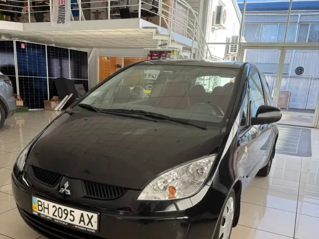 Mitsubishi Colt - фото 1