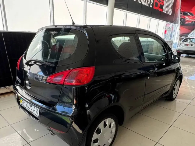 Mitsubishi Colt - фото 5