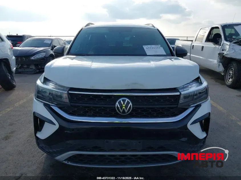 Volkswagen Taos - фото 7