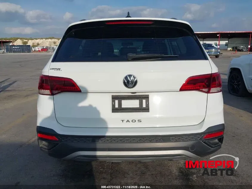 Volkswagen Taos - фото 8