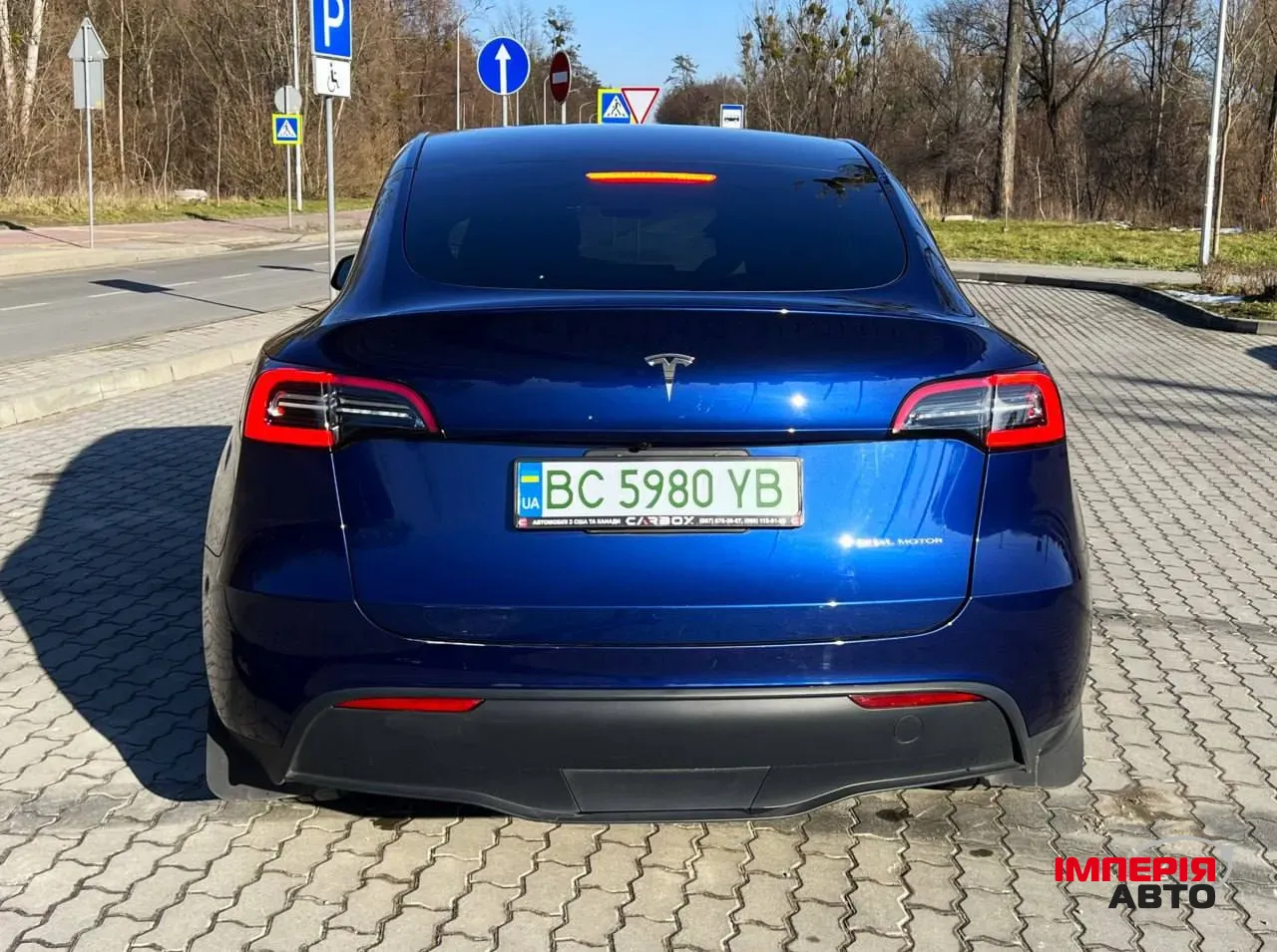 Tesla Model Y - фото 8