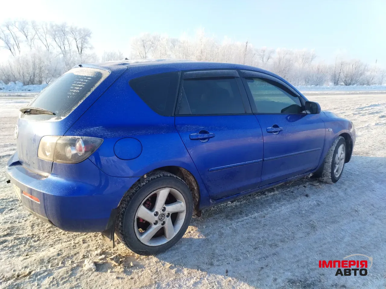 Mazda 3 - фото 4