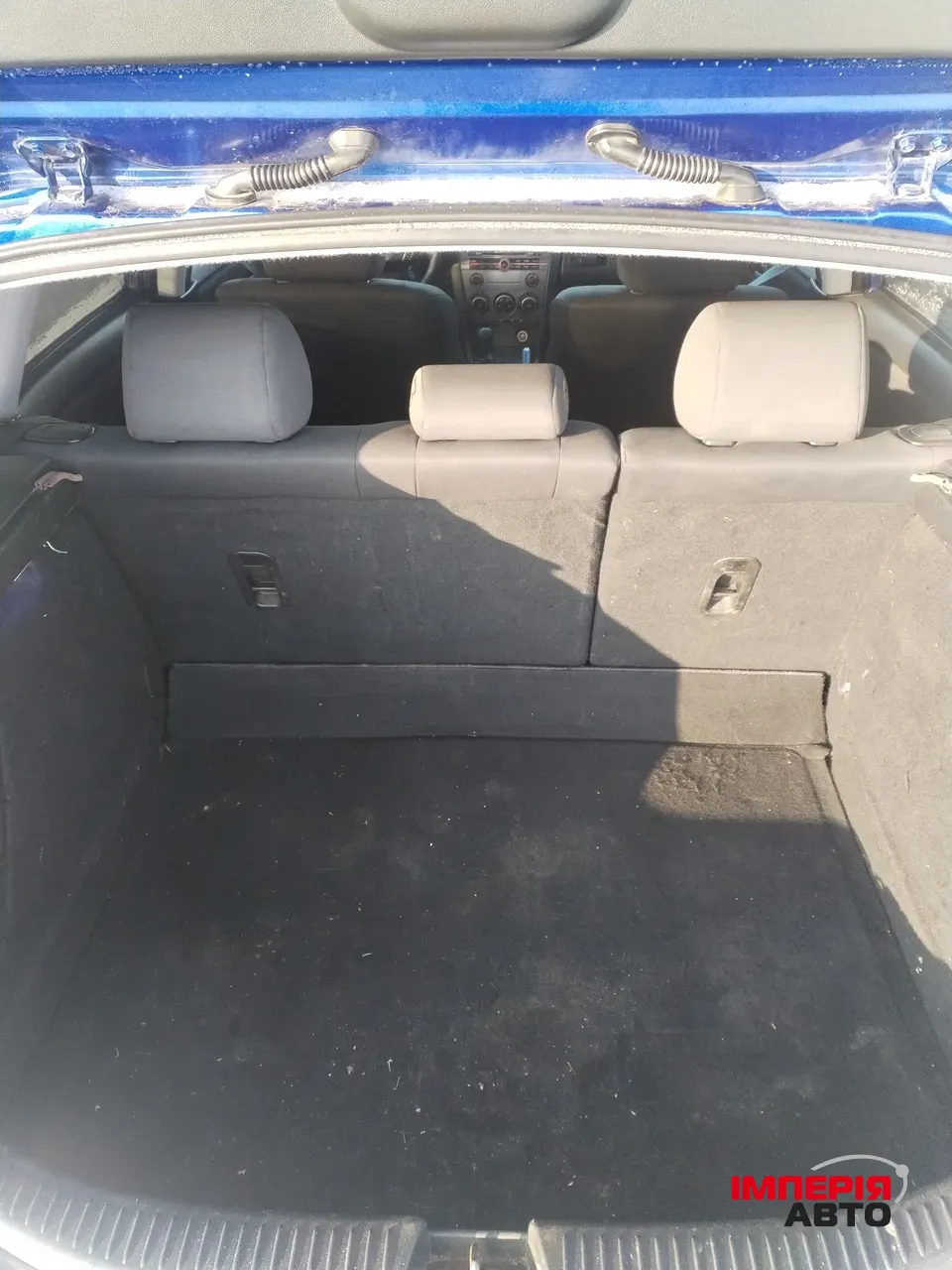 Mazda 3 - фото 12