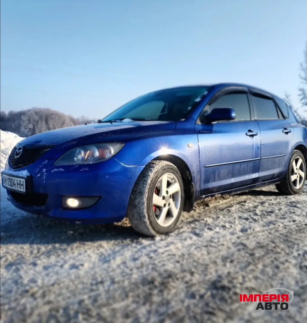 Mazda 3 - фото 3