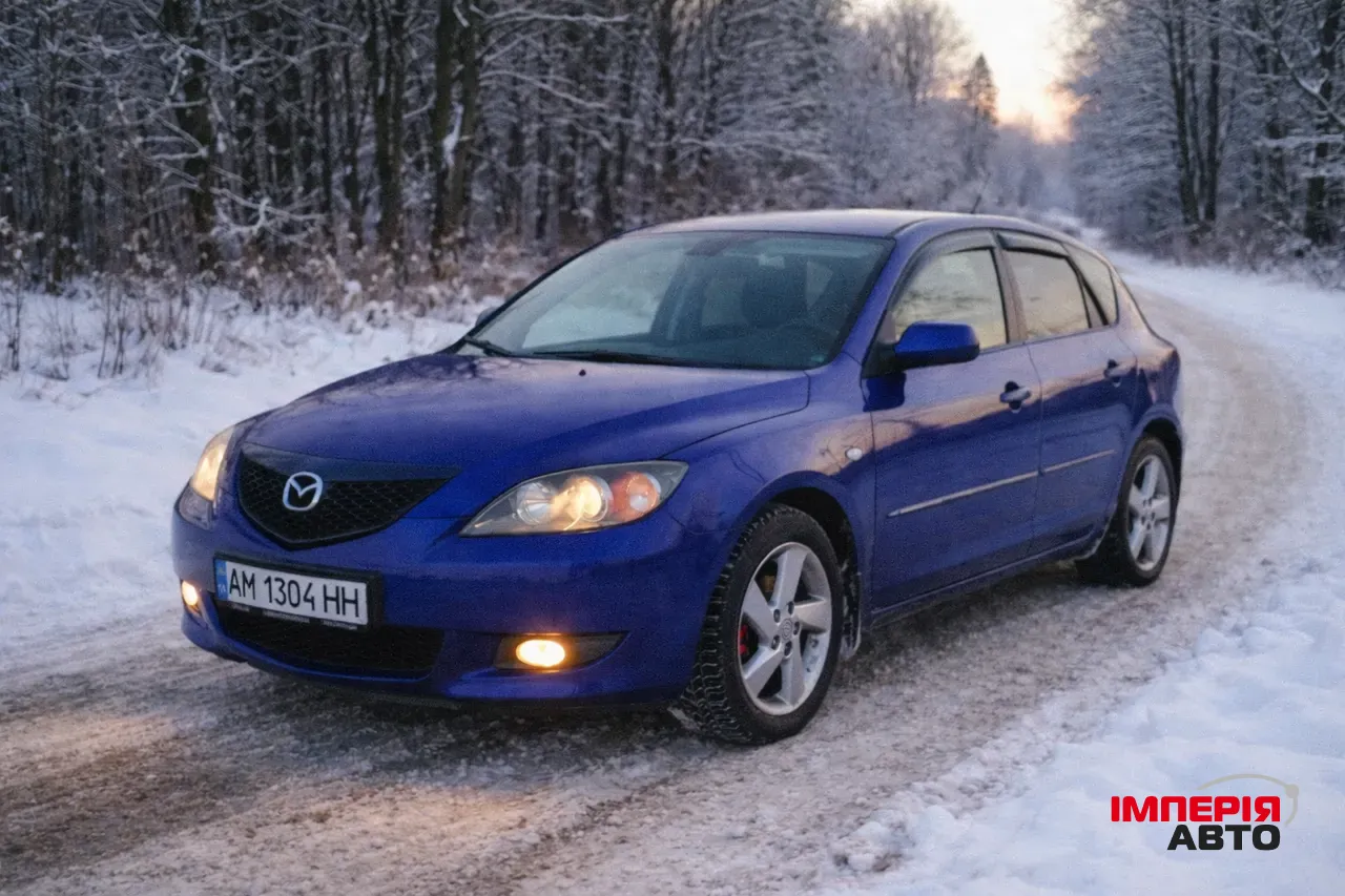 Mazda 3 - фото 1