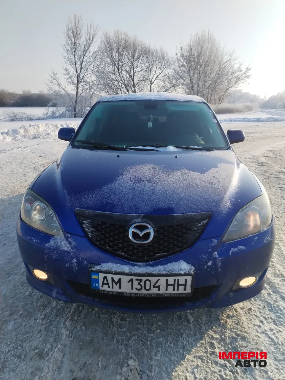 Mazda 3 - фото 6