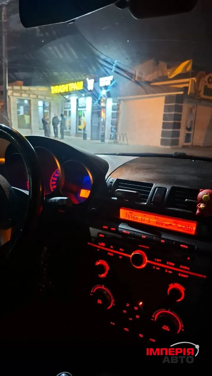 Mazda 3 - фото 7