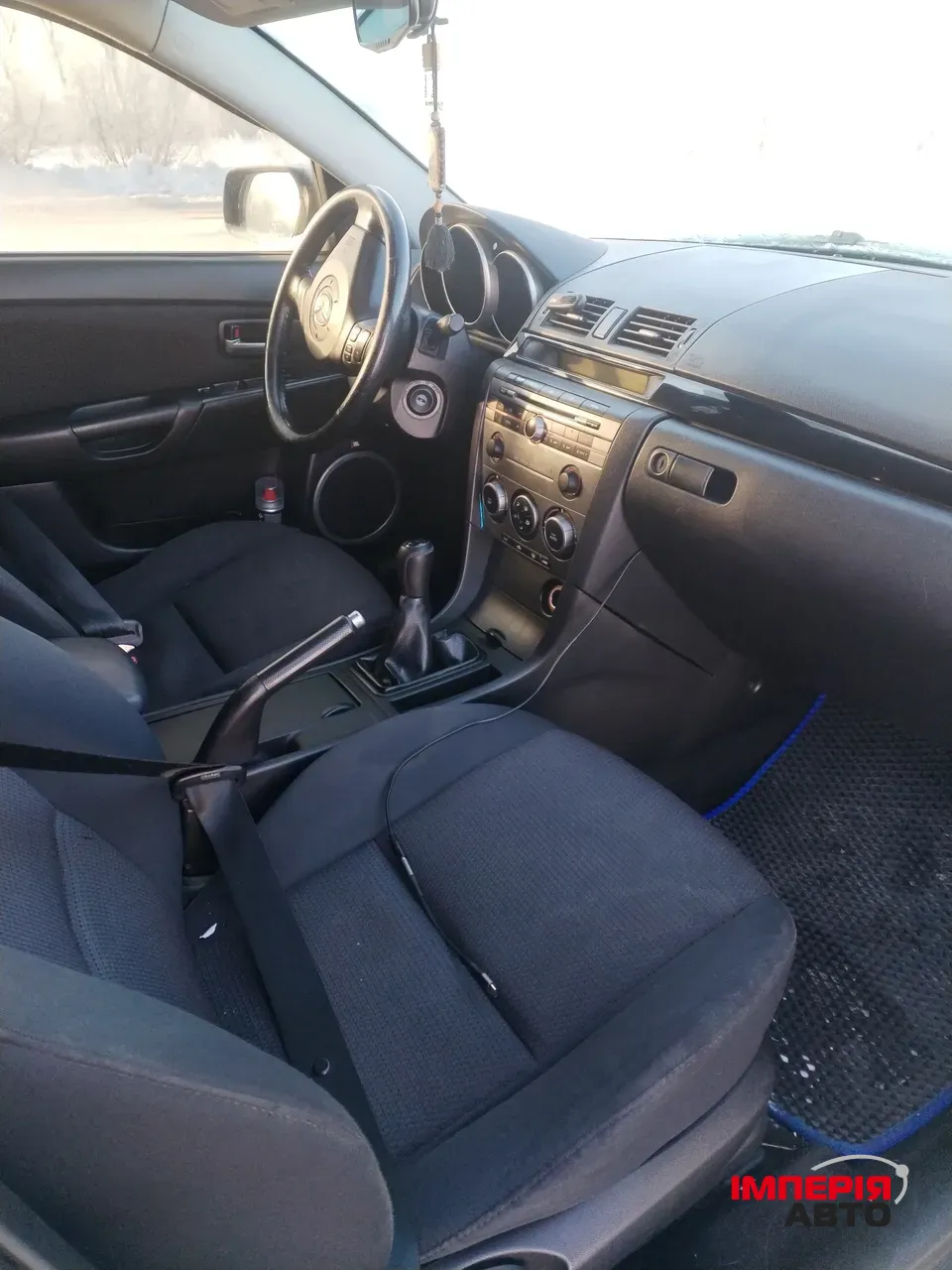 Mazda 3 - фото 9