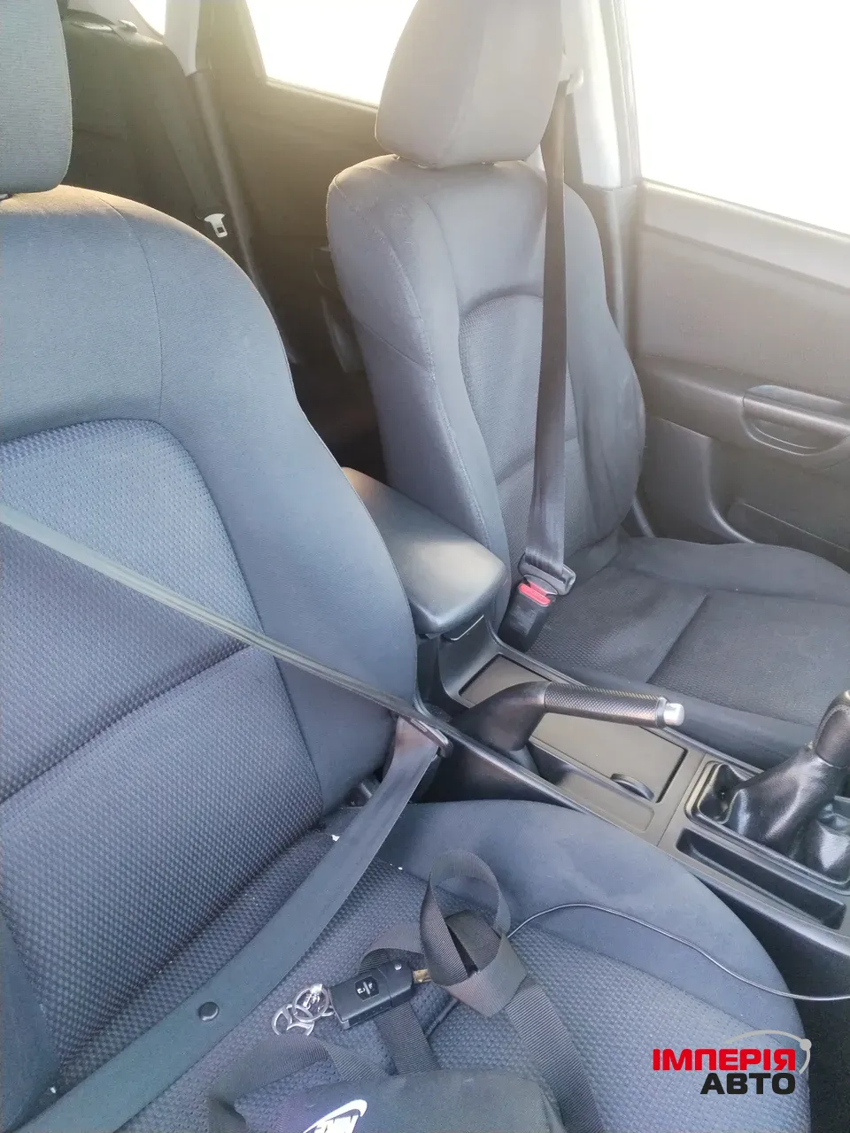 Mazda 3 - фото 11