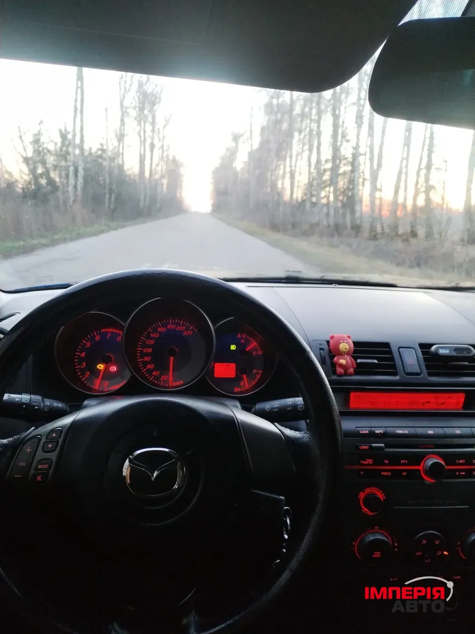 Mazda 3 - фото 8