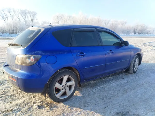 Mazda 3 - фото 4