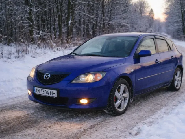 Mazda 3 - фото 1