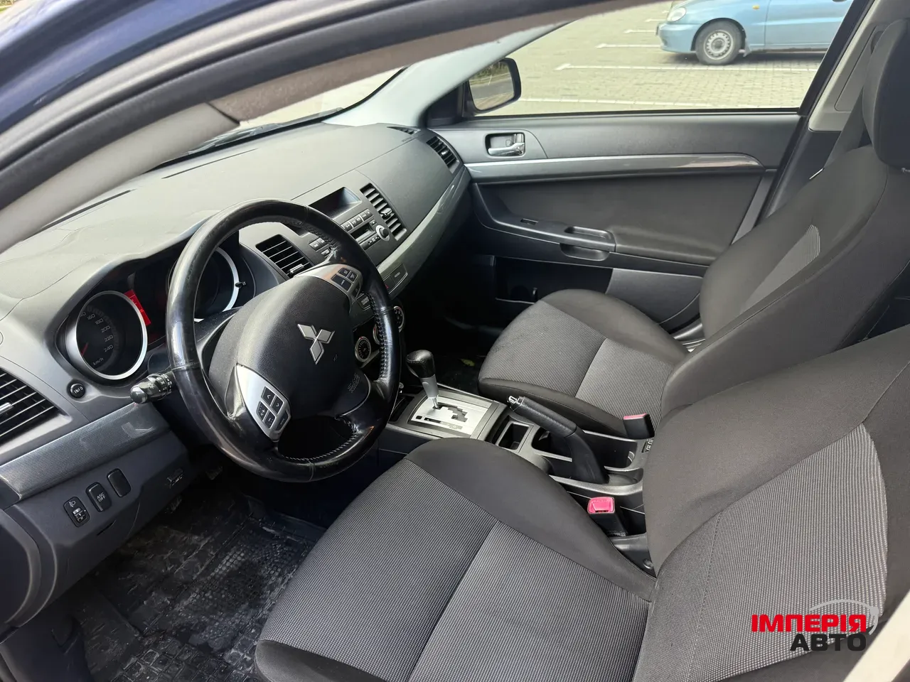 Mitsubishi Lancer - фото 10